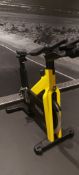 Technogym Yellow Spin Bike