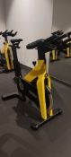 Technogym Yellow Spin Bike