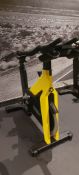 Technogym Yellow Spin Bike