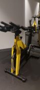 Technogym Yellow Spin Bike