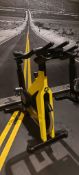 Technogym Yellow Spin Bike