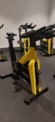 Technogym Yellow Spin Bike