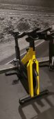 Technogym Yellow Spin Bike