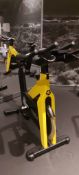 Technogym Yellow Spin Bike