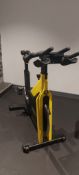 Technogym Yellow Spin Bike