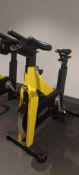 Technogym Yellow Spin Bike