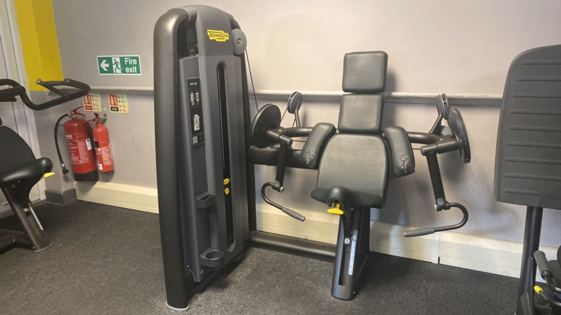 Technogym Arm Curl Machine