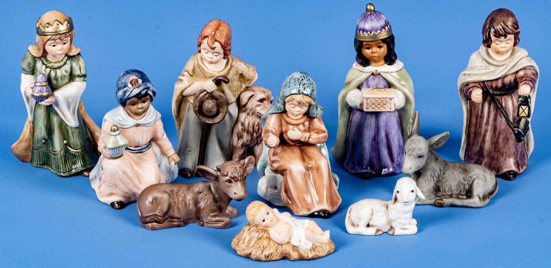 10teiliges Set weihnachtlicher Krippenfiguren, Goebel-Porzellan, versch. farbig staffiertes Porzell