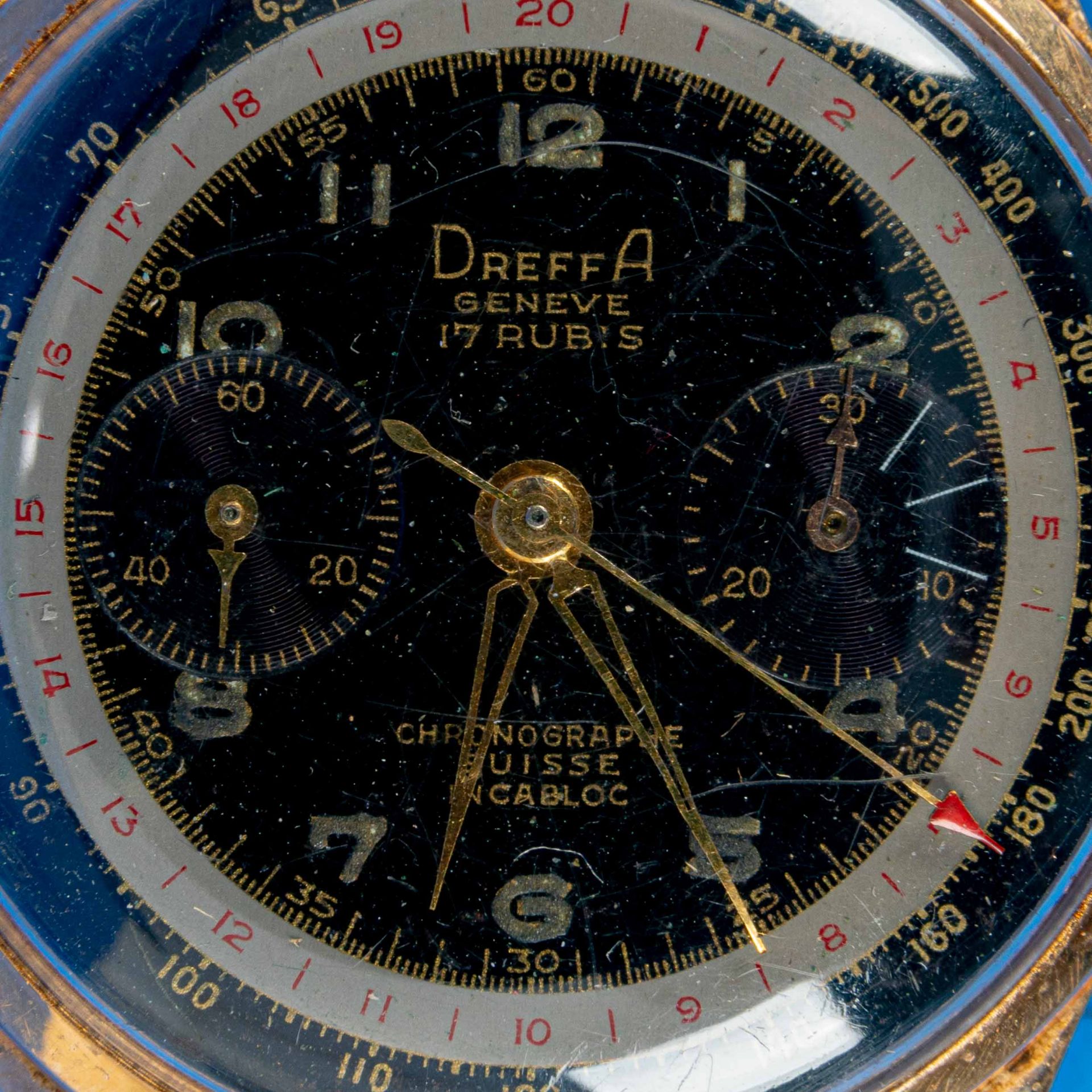 "DREFFA" - Chronograph Herrenarmbanduhr. Ungeprüftes Uhrwerk in 18 k Gelbgoldgehäuse an getragenem 