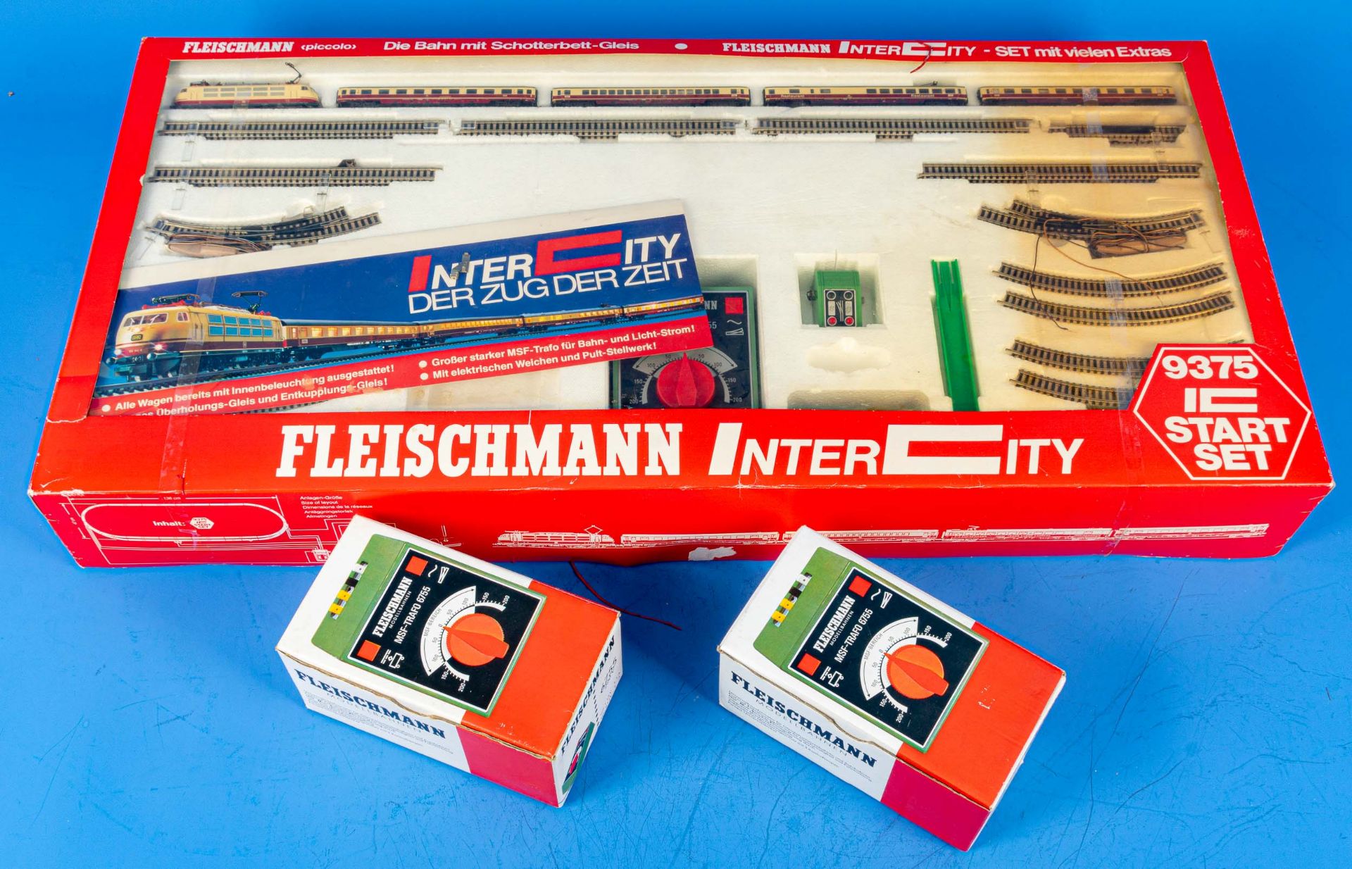 Fleischmann Intercity 9375 Starter-Set in orig. Kartonage sowie 2 x MSF-Trafo 6675, ebenfalls ins o