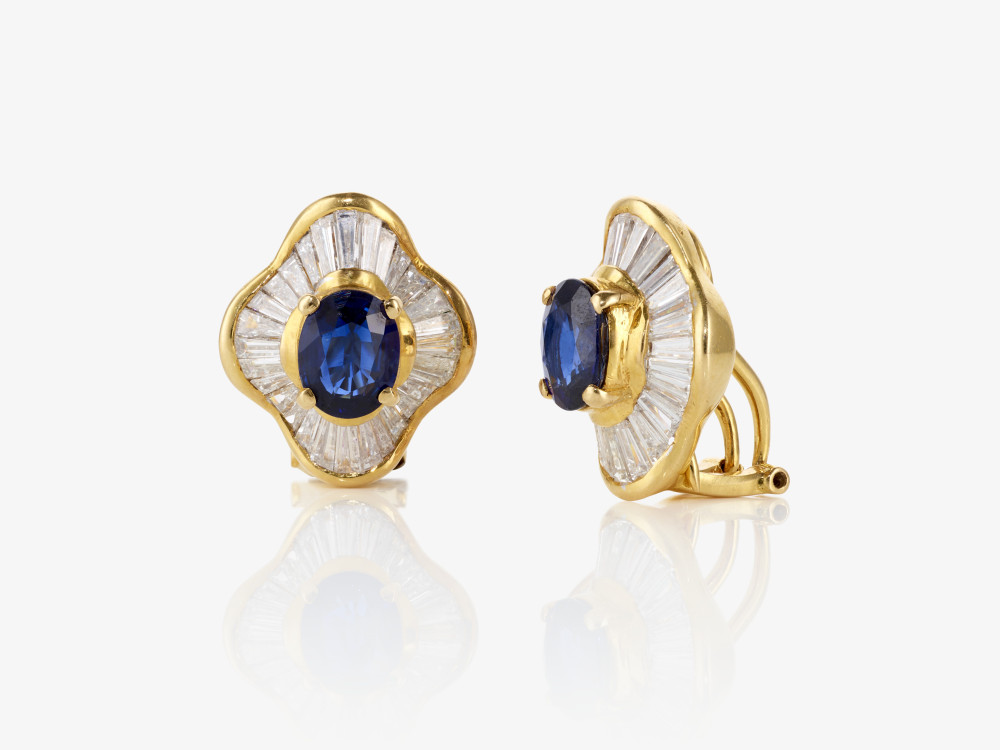 A pair of ear clip / stud earrings with diamonds and sapphires