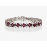 A cocktail bracelet decorated with brilliant cut diamonds and rubies - Germany, 1970s 
