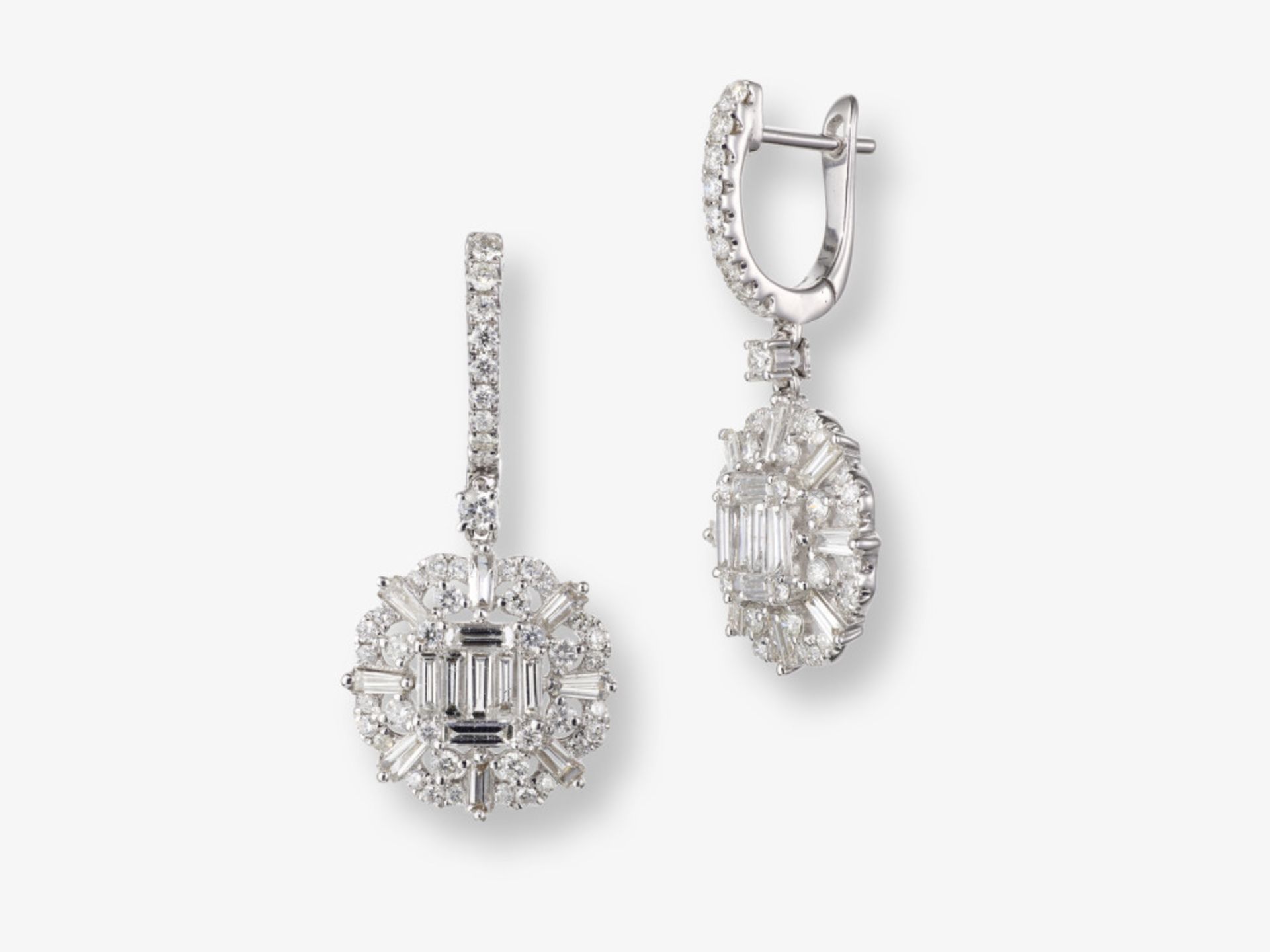 A pair of drop earrings decorated with brilliant- and baguette-cut diamonds - Italy 