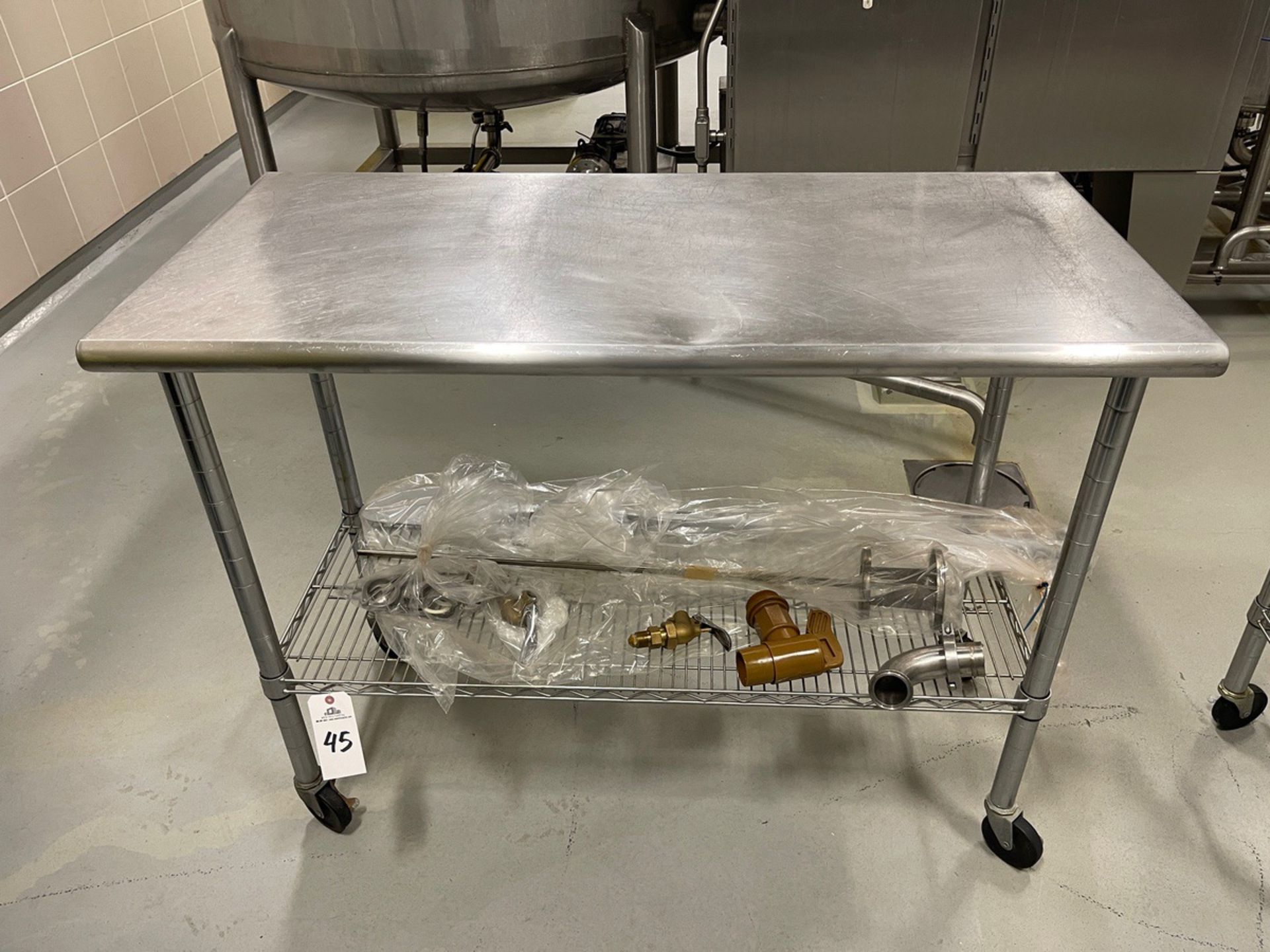 Stainless Steel Lab Table with Wire Shelf on Casters, Approx. 2'x4' | Rig Fee $50