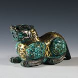 Gold and silver inlaid pine stone auspicious beast from the Han dynasty