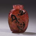 Tourmaline flower and bird snuff bottle from the Qing Dynasty