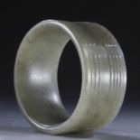 Corrugated three-dimensional jade ring from western zhou Period