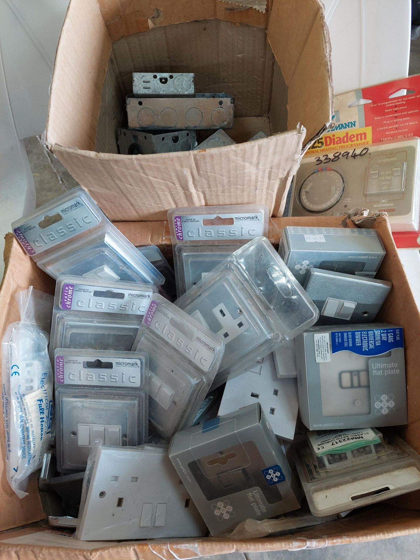 Qty of electrical switches, faceplates, backboxes and a timer. NO VAT.