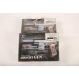 2 new boxed and sealed Air-Soft handguns #1597