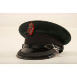 An early PSNI Cap with applied King's Crown badge mounted on red felt. From the Bushmills Police