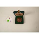 A cased commorative cast bronze medallion; General Michael Collins; fitted in a leatherette box;