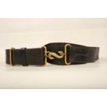 A Royal Irish Constabulary brass and leather Snake Belt; overall length 100cm Reserve: £30 #1192