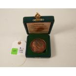 A cased commorative cast bronze medallion; General Michael Collins; fitted in a leatherette box;