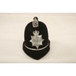 A Police Constable hat with applied West Mercia Constabulary plate (31cm long) Reserve: £25 #1212