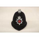 A Police Constable hat with applied Essex Police plate (31.5cm long) Reserve: £25 #1213