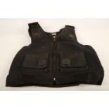 A possible ex Police Officers black canvas flak jacket / body armour (3.7kg!) and trousers