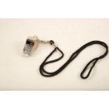 An Acme 'Thunderer' stainless steel Policeman's whistle on black cord (whistle length 45mm) Reserve: