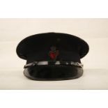 A Possible Replica 1953 - 1970 Royal Ulster Constabulary Constables cap; and chin strap with
