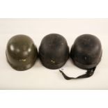 A Trio of late 20th century black military helmets; possibly Serbian Mile Dragic Model 97 28cm