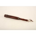 A painted and ebonised Victorian policeman's truncheon; decorated with V. R. 1; with rurned handle