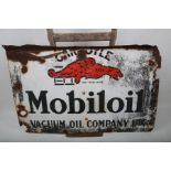 Mobiloil; Vacuum Oil Company Ltd.; a white enamel advertising sign