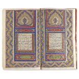 AN ILLUMINATED QAJAR QURAN BY MIRZA AHMAD WAQAR AL-SHIRAZI, DATED 1271 AH/1854 AD