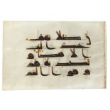 A QURAN LEAF IN KUFIC SCRIPT ON VELLUM, NEAR EAST OR NORTH AFRICA, 9TH CENTURY