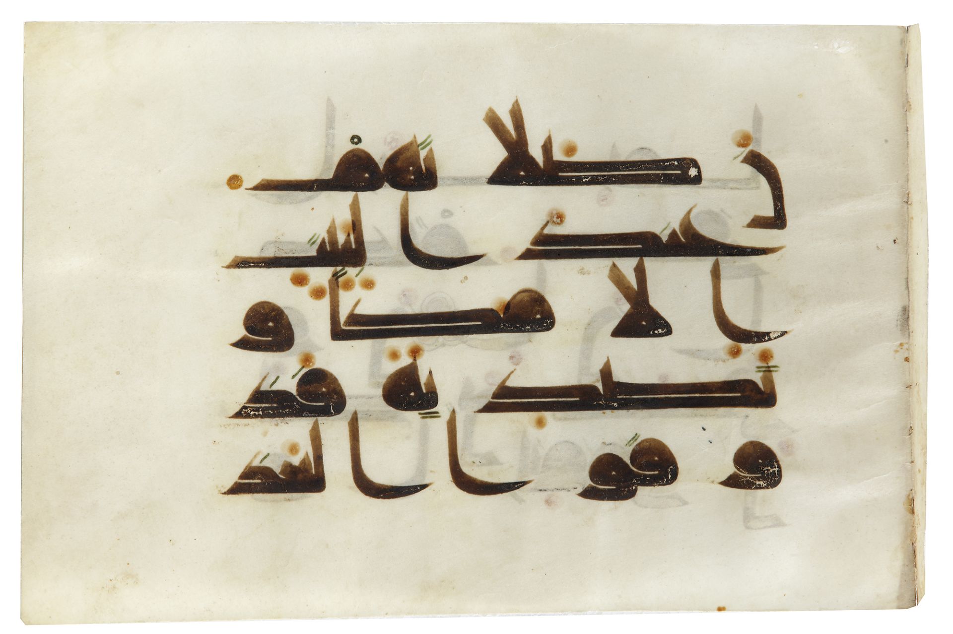 A QURAN LEAF IN KUFIC SCRIPT ON VELLUM, NEAR EAST OR NORTH AFRICA, 9TH CENTURY