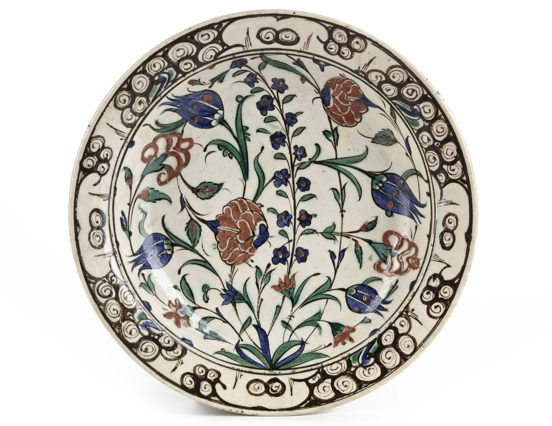 AN IZNIK 'STORM IN A TEACUP' DESIGN POTTERY DISH, TURKEY, 16TH CENTURY