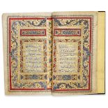 AN ILLUMINATED QAJAR QURAN BY JA'FAR AL-NARDI, DATED 1240 AH/1824 AD