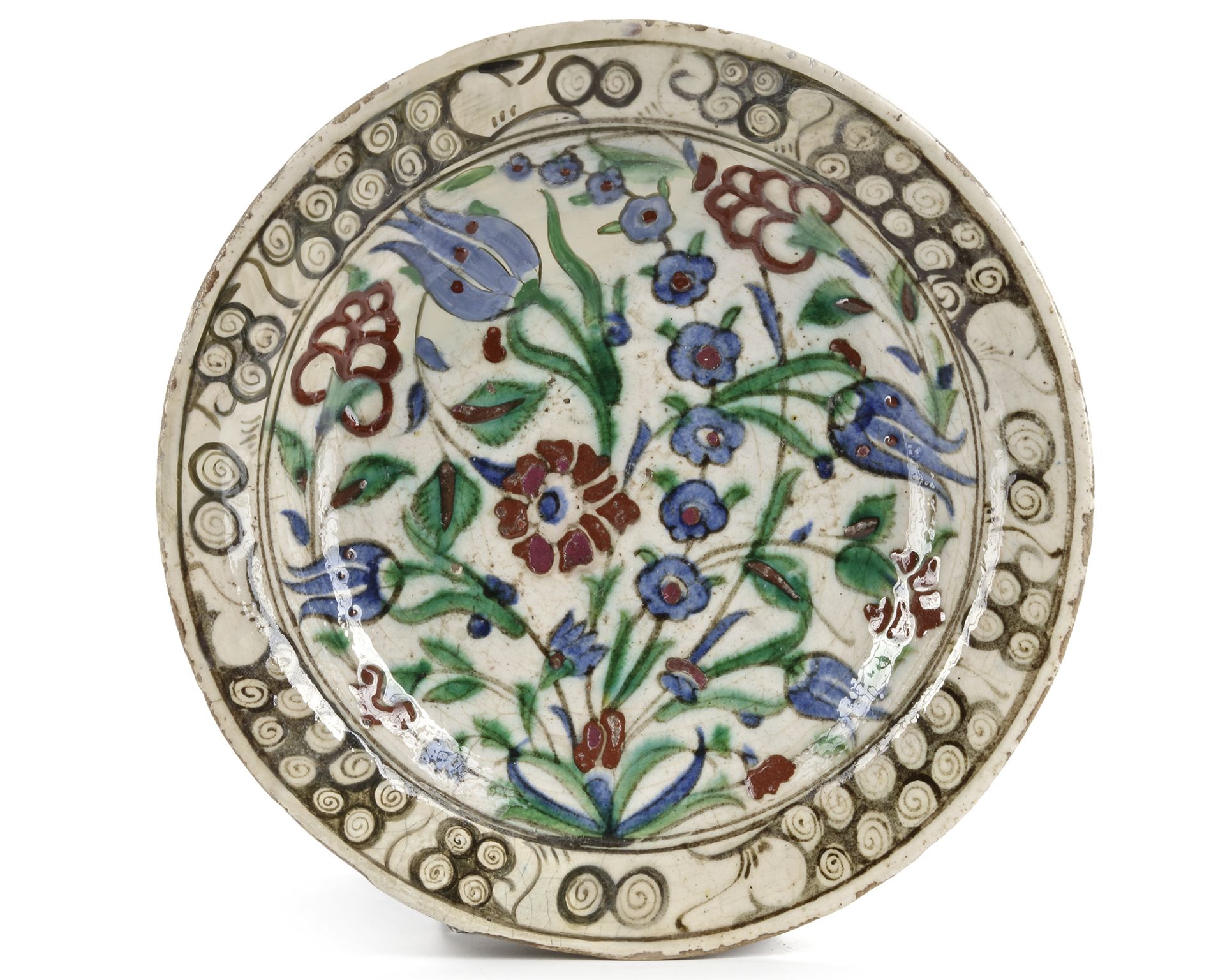 AN IZNIK 'STORM IN A TEACUP' DESIGN POTTERY DISH, TURKEY, 16TH CENTURY