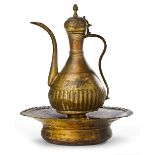 AN OTTOMAN GILT-COPPER (TOMBAK) EWER AND BASIN, 18TH CENTURY