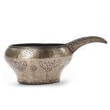 AN ENGRAVED SAFAVID TINNED COPPER SPOUTED POURING BOWL, PERSIA, 17TH CENTURY