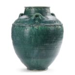 A LARGE POST SASSANIAN TURQUOISE GLAZED POTTERY STORAGE JAR, PERSIA, 6TH-8TH CENTURY