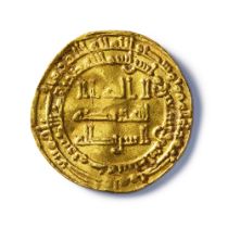 AN ISLAMIC GOLD DINAR MINTED DURING THE ABBASID DYNASTY , THE CALIPH ALMUKTAI, IN 292AH/904AD AT MEC