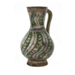 AN IZNIK POTTERY JUG, OTTOMAN TURKEY, CIRCA 1580