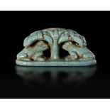 AN EGYPTIAN FAIENCE AMULET/ STAMP SEALS, CIRCA 4TH CENTURY B.C.