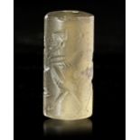A NEO-ASSYRIAN OR NEO-BABYLONIAN CHALCEDONY CYLINDER SEAL, CIRCA 8TH-7TH CENTURY B.C.