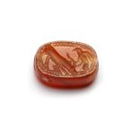 AN EASTERN GREEK CARNELIAN SCARABOID, CIRCA 500 B.C.