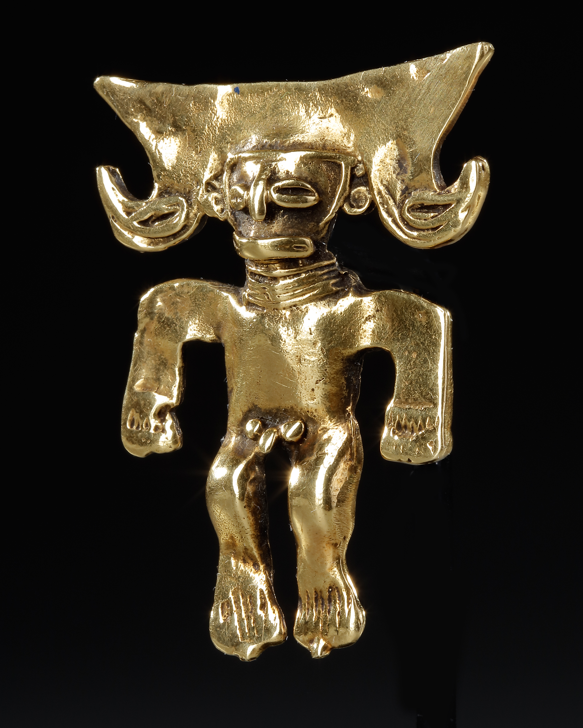 A PRE COLOMBIAN GOLD FIGURE, CIRCA 800-1200 A.D